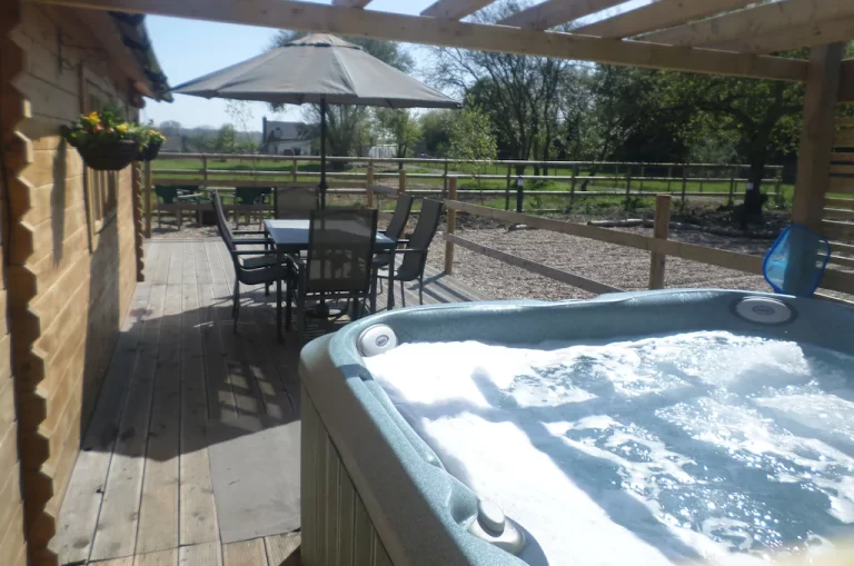 rustic lodges in Kent with hot tub 2