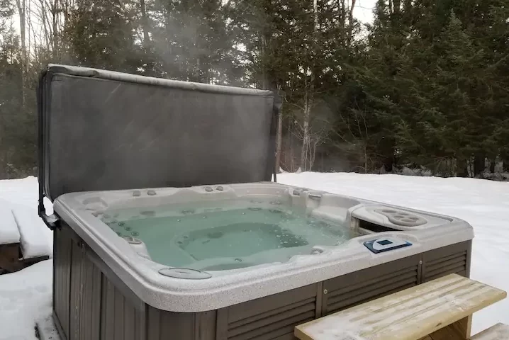Cabins with hot tub in New Hampshire Secluded Lumberjack Cabin3