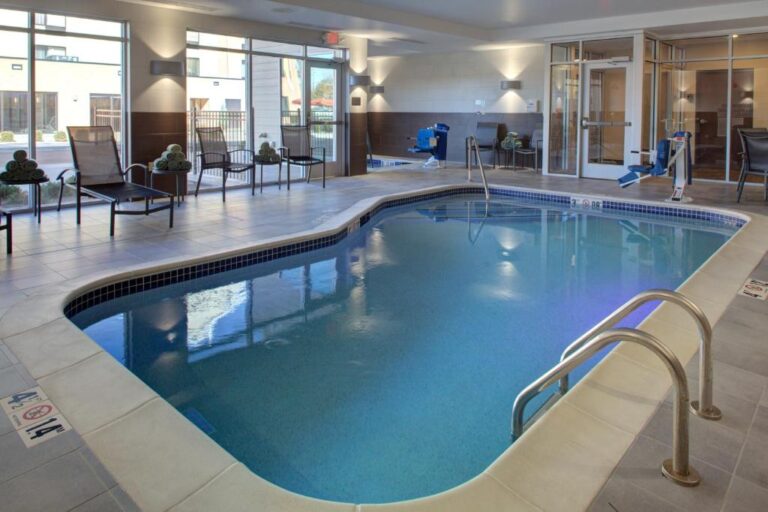 Farfield Inn & Suites - pool area with hot tub 2