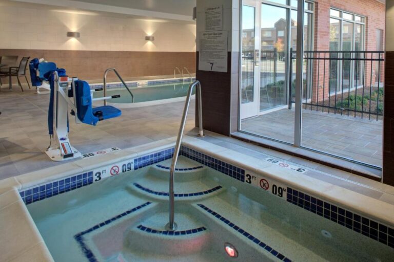 Farfield Inn & Suites - pool area with hot tub